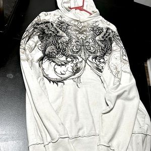 It a Halloween  sweater and it’s has  a little bit of damage on it